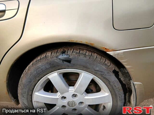 Жовтий Ніссан Максіма, об'ємом двигуна 2 л та пробігом 305 тис. км за 5100 $, фото 7 на Automoto.ua