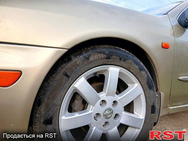 Жовтий Ніссан Максіма, об'ємом двигуна 2 л та пробігом 305 тис. км за 5100 $, фото 3 на Automoto.ua