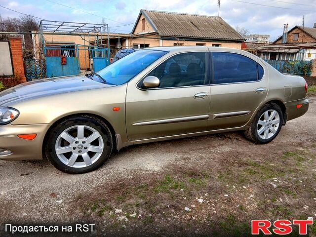 Жовтий Ніссан Максіма, об'ємом двигуна 2 л та пробігом 305 тис. км за 5100 $, фото 4 на Automoto.ua