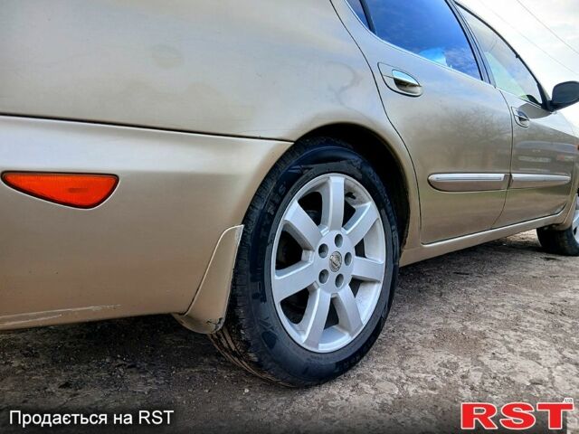 Жовтий Ніссан Максіма, об'ємом двигуна 2 л та пробігом 305 тис. км за 5100 $, фото 10 на Automoto.ua