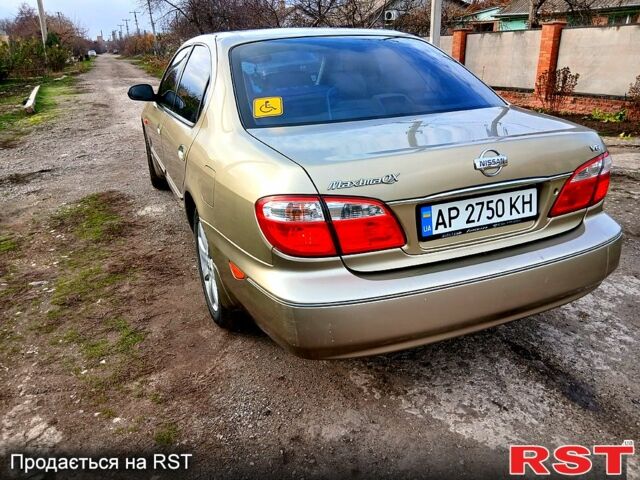 Жовтий Ніссан Максіма, об'ємом двигуна 2 л та пробігом 305 тис. км за 5100 $, фото 6 на Automoto.ua