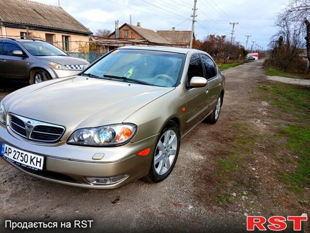 Жовтий Ніссан Максіма, об'ємом двигуна 2 л та пробігом 305 тис. км за 5100 $, фото 2 на Automoto.ua