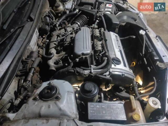 Серый Ниссан Максима, объемом двигателя 2 л и пробегом 202 тыс. км за 2100 $, фото 7 на Automoto.ua