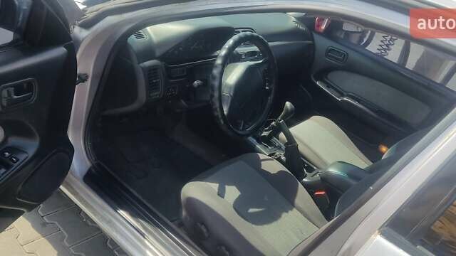 Серый Ниссан Максима, объемом двигателя 2 л и пробегом 202 тыс. км за 2100 $, фото 3 на Automoto.ua