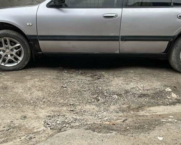 Серый Ниссан Максима, объемом двигателя 2 л и пробегом 280 тыс. км за 1250 $, фото 1 на Automoto.ua