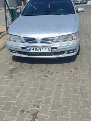 Серый Ниссан Максима, объемом двигателя 2 л и пробегом 202 тыс. км за 2100 $, фото 2 на Automoto.ua