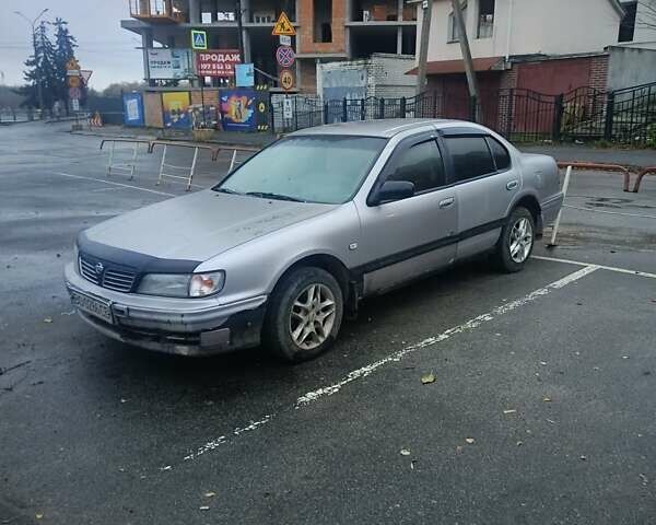 Серый Ниссан Максима, объемом двигателя 2 л и пробегом 284 тыс. км за 1000 $, фото 4 на Automoto.ua