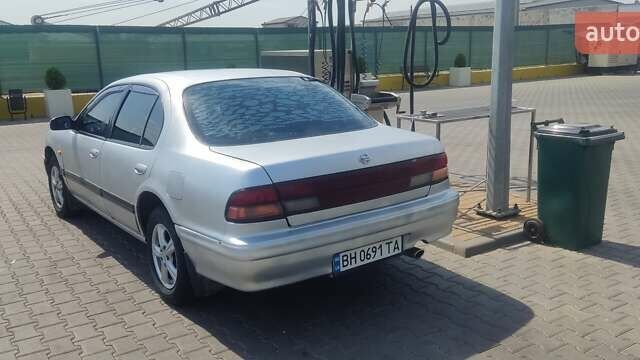 Серый Ниссан Максима, объемом двигателя 2 л и пробегом 202 тыс. км за 2100 $, фото 1 на Automoto.ua