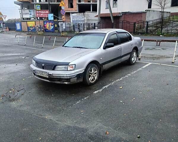 Серый Ниссан Максима, объемом двигателя 2 л и пробегом 284 тыс. км за 1000 $, фото 1 на Automoto.ua