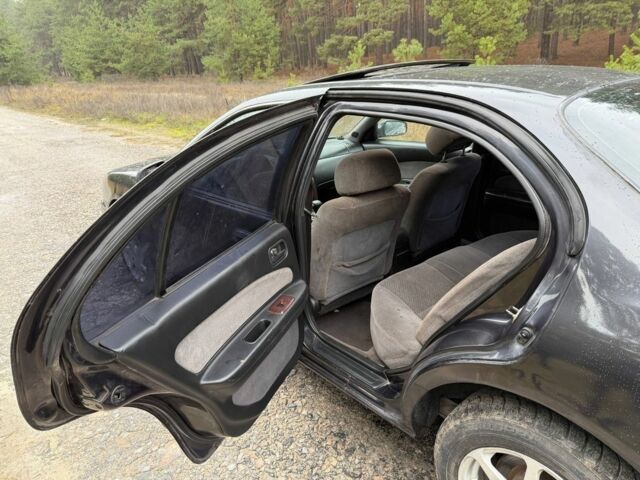 Сірий Ніссан Максіма, об'ємом двигуна 2 л та пробігом 275 тис. км за 2450 $, фото 8 на Automoto.ua