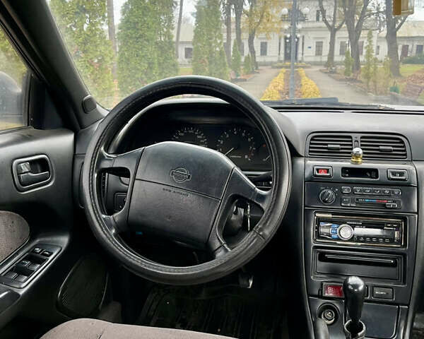 Сірий Ніссан Максіма, об'ємом двигуна 2 л та пробігом 480 тис. км за 1450 $, фото 5 на Automoto.ua