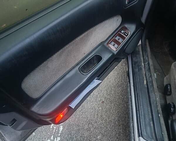 Серый Ниссан Максима, объемом двигателя 2 л и пробегом 284 тыс. км за 1000 $, фото 10 на Automoto.ua