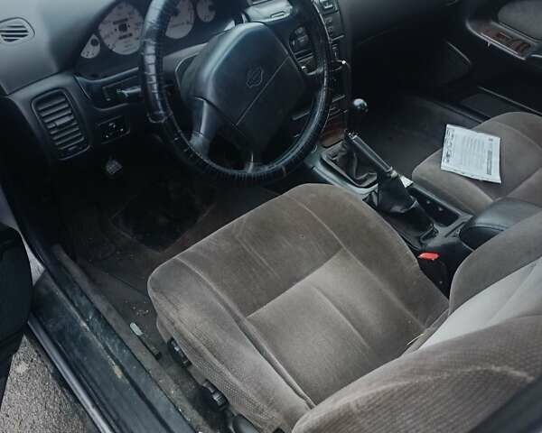 Серый Ниссан Максима, объемом двигателя 2 л и пробегом 284 тыс. км за 1000 $, фото 6 на Automoto.ua