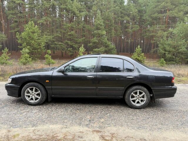 Сірий Ніссан Максіма, об'ємом двигуна 2 л та пробігом 275 тис. км за 2450 $, фото 5 на Automoto.ua