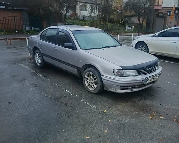 Серый Ниссан Максима, объемом двигателя 2 л и пробегом 284 тыс. км за 1000 $, фото 3 на Automoto.ua