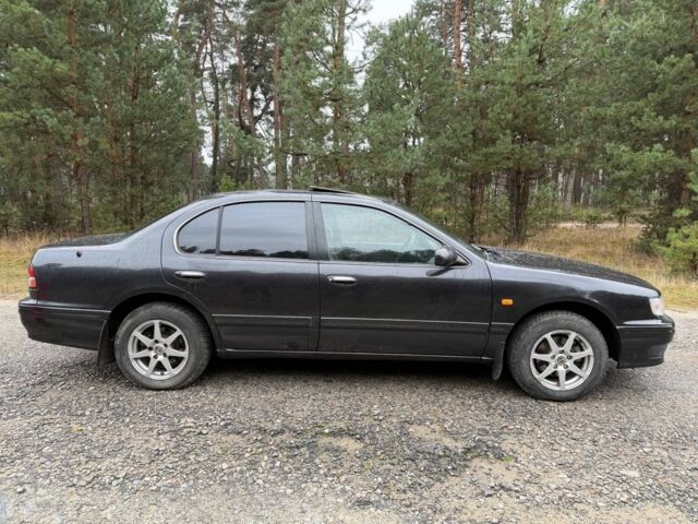 Сірий Ніссан Максіма, об'ємом двигуна 2 л та пробігом 275 тис. км за 2450 $, фото 4 на Automoto.ua