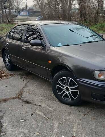 Серый Ниссан Максима, объемом двигателя 3 л и пробегом 300 тыс. км за 2600 $, фото 1 на Automoto.ua