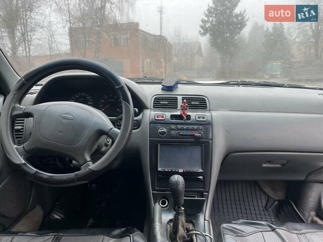 Серый Ниссан Максима, объемом двигателя 3 л и пробегом 480 тыс. км за 1600 $, фото 6 на Automoto.ua