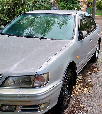 Серый Ниссан Максима, объемом двигателя 3 л и пробегом 340 тыс. км за 1500 $, фото 2 на Automoto.ua