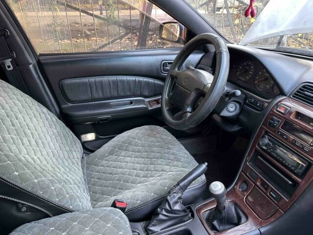 Серый Ниссан Максима, объемом двигателя 2 л и пробегом 280 тыс. км за 2500 $, фото 6 на Automoto.ua