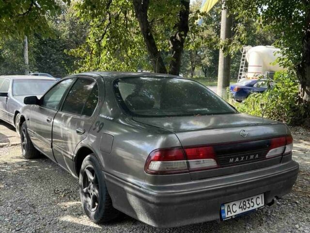 Сірий Ніссан Максіма, об'ємом двигуна 3 л та пробігом 350 тис. км за 1999 $, фото 1 на Automoto.ua