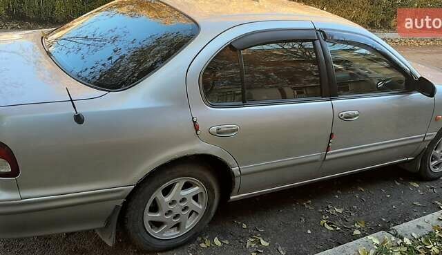 Сірий Ніссан Максіма, об'ємом двигуна 3 л та пробігом 240 тис. км за 2970 $, фото 4 на Automoto.ua