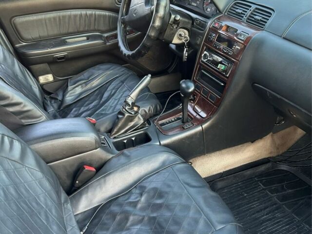 Серый Ниссан Максима, объемом двигателя 3 л и пробегом 500 тыс. км за 2199 $, фото 5 на Automoto.ua