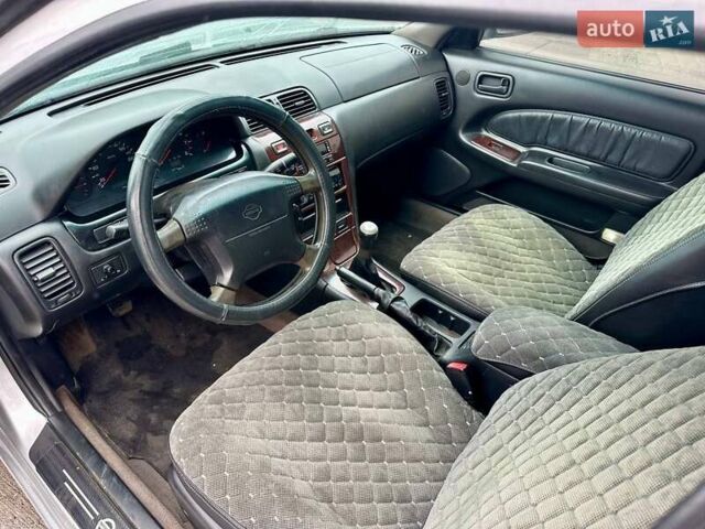 Серый Ниссан Максима, объемом двигателя 2 л и пробегом 300 тыс. км за 2500 $, фото 5 на Automoto.ua