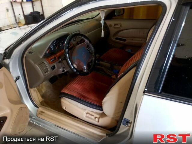 Сірий Ніссан Максіма, об'ємом двигуна 3 л та пробігом 380 тис. км за 3300 $, фото 5 на Automoto.ua
