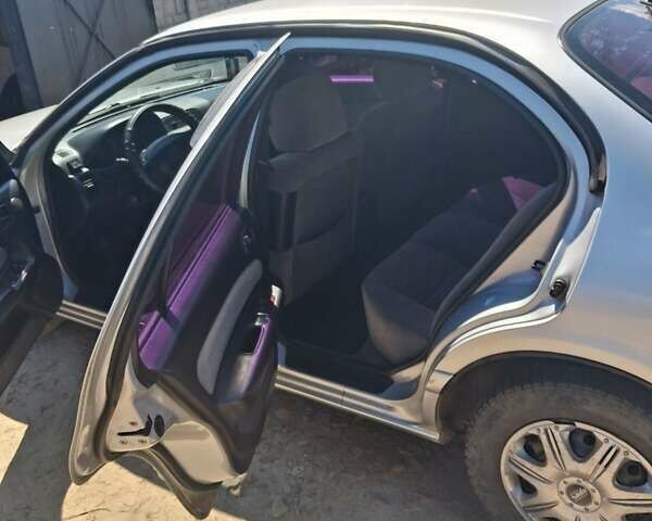 Серый Ниссан Максима, объемом двигателя 2 л и пробегом 294 тыс. км за 3100 $, фото 5 на Automoto.ua