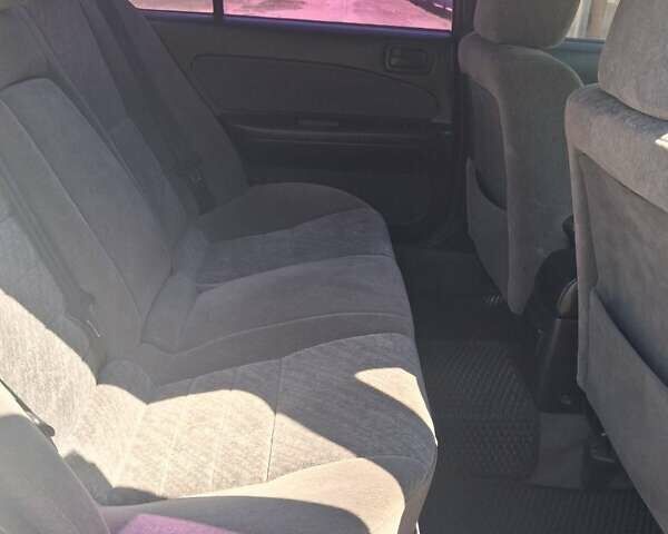 Серый Ниссан Максима, объемом двигателя 2 л и пробегом 294 тыс. км за 3100 $, фото 12 на Automoto.ua