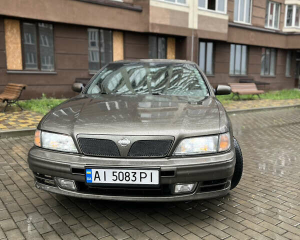 Серый Ниссан Максима, объемом двигателя 2 л и пробегом 539 тыс. км за 2500 $, фото 1 на Automoto.ua