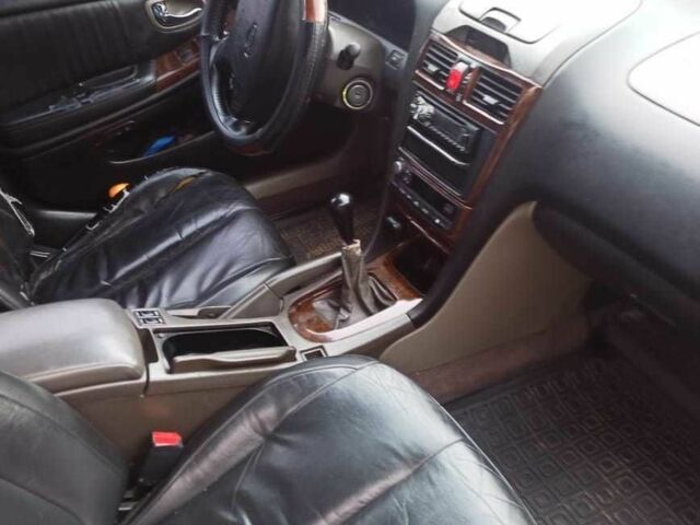 Серый Ниссан Максима, объемом двигателя 2 л и пробегом 328 тыс. км за 2000 $, фото 4 на Automoto.ua