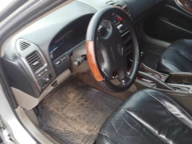 Серый Ниссан Максима, объемом двигателя 2 л и пробегом 328 тыс. км за 2000 $, фото 7 на Automoto.ua