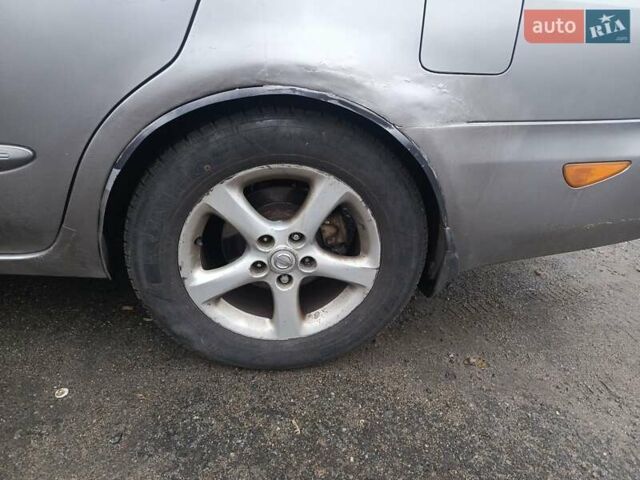 Сірий Ніссан Максіма, об'ємом двигуна 3 л та пробігом 400 тис. км за 2200 $, фото 4 на Automoto.ua