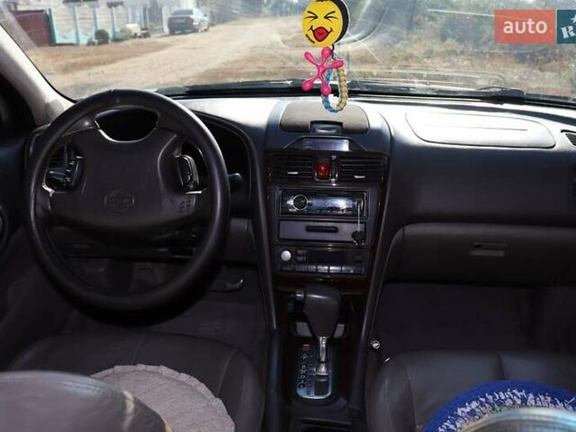 Сірий Ніссан Максіма, об'ємом двигуна 3 л та пробігом 410 тис. км за 3000 $, фото 7 на Automoto.ua