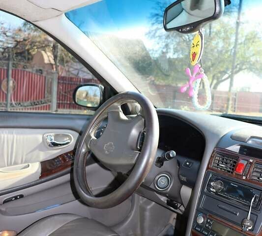 Сірий Ніссан Максіма, об'ємом двигуна 3 л та пробігом 410 тис. км за 3000 $, фото 9 на Automoto.ua