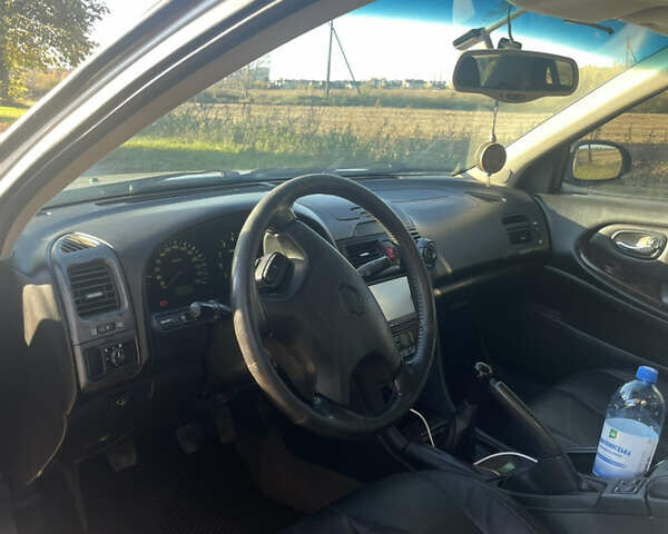 Сірий Ніссан Максіма, об'ємом двигуна 2 л та пробігом 302 тис. км за 3299 $, фото 3 на Automoto.ua