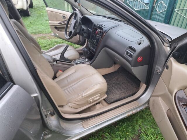 Серый Ниссан Максима, объемом двигателя 3 л и пробегом 487 тыс. км за 2200 $, фото 5 на Automoto.ua