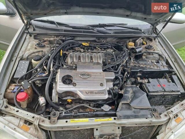 Сірий Ніссан Максіма, об'ємом двигуна 3 л та пробігом 487 тис. км за 2200 $, фото 18 на Automoto.ua