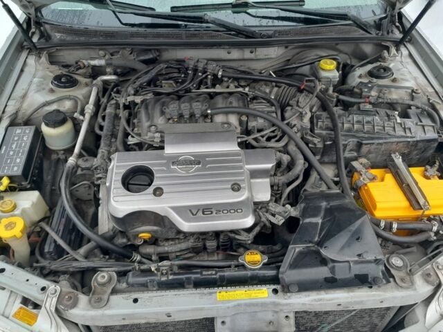 Сірий Ніссан Максіма, об'ємом двигуна 2 л та пробігом 287 тис. км за 4000 $, фото 2 на Automoto.ua