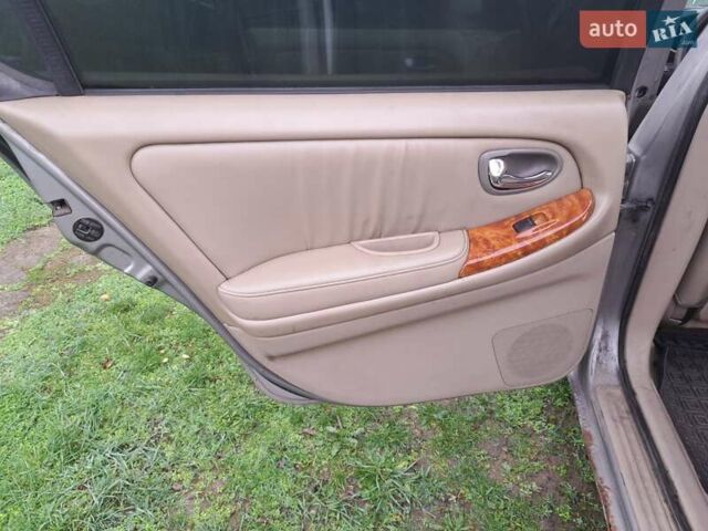 Сірий Ніссан Максіма, об'ємом двигуна 3 л та пробігом 487 тис. км за 2200 $, фото 13 на Automoto.ua