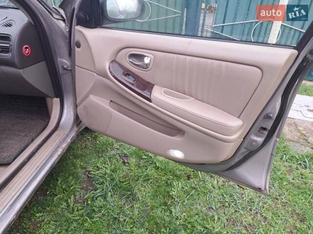 Сірий Ніссан Максіма, об'ємом двигуна 3 л та пробігом 487 тис. км за 2200 $, фото 7 на Automoto.ua