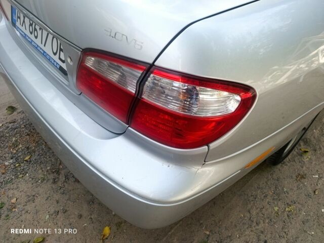 Сірий Ніссан Максіма, об'ємом двигуна 3 л та пробігом 300 тис. км за 3200 $, фото 2 на Automoto.ua