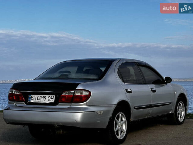 Серый Ниссан Максима, объемом двигателя 3 л и пробегом 390 тыс. км за 2000 $, фото 5 на Automoto.ua