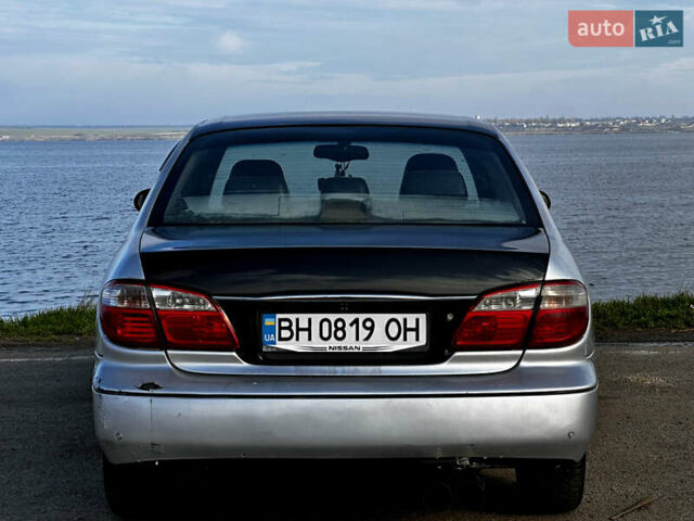 Серый Ниссан Максима, объемом двигателя 3 л и пробегом 390 тыс. км за 2000 $, фото 4 на Automoto.ua