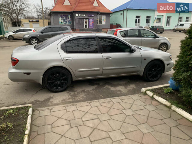 Серый Ниссан Максима, объемом двигателя 3 л и пробегом 328 тыс. км за 4600 $, фото 2 на Automoto.ua