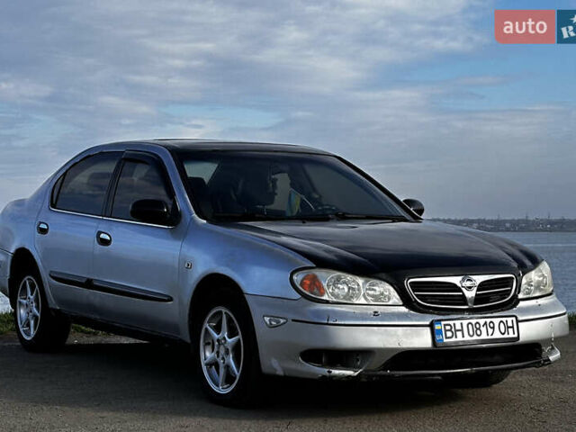 Серый Ниссан Максима, объемом двигателя 3 л и пробегом 390 тыс. км за 2000 $, фото 1 на Automoto.ua