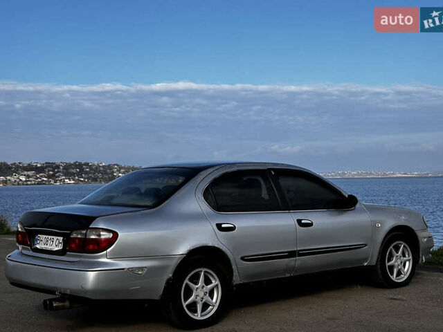 Серый Ниссан Максима, объемом двигателя 3 л и пробегом 390 тыс. км за 2000 $, фото 6 на Automoto.ua