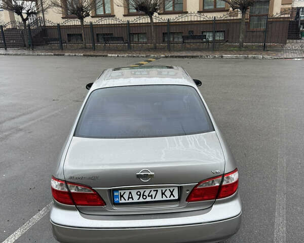 Серый Ниссан Максима, объемом двигателя 2 л и пробегом 285 тыс. км за 2350 $, фото 13 на Automoto.ua